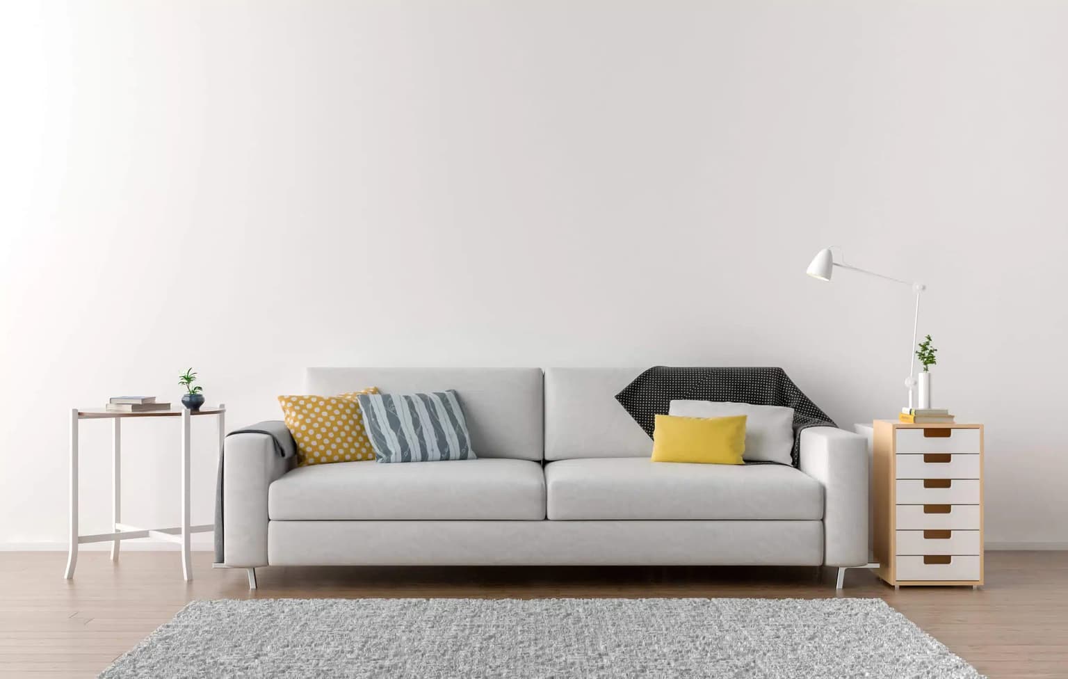 Bright living room with a white sofa and clean light-gray carpet in Chapin, SC